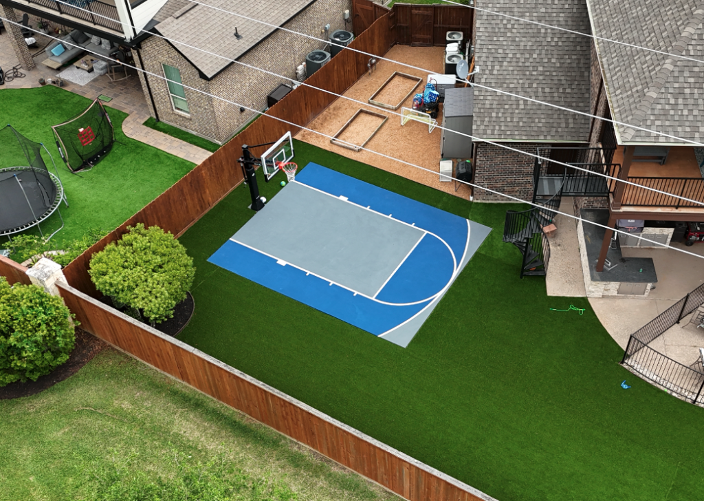 Mini basketball court in a Houston backyard with professional construction and custom layout